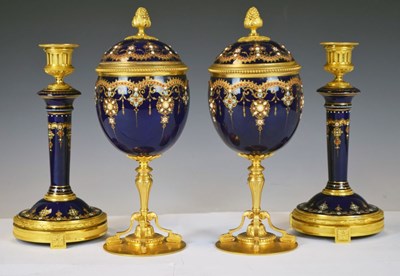 Lot 181 - Pair of 19th Century French covered cups and similar candlesticks