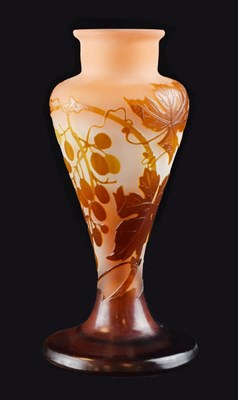 Lot 317 - Galle cameo vase - amber glass overlaid on frosted peach body, cut with grape and vine