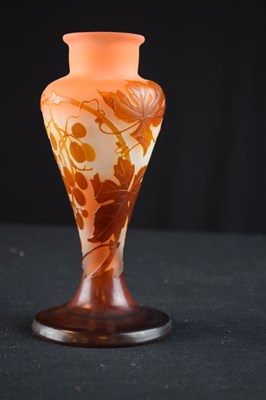 Lot 317 - Galle cameo vase - amber glass overlaid on frosted peach body, cut with grape and vine