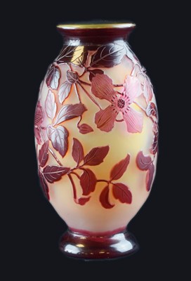 Lot 306 - Galle cameo vase - red glass overlaid on frosted body, cut with trailing flowers and foliage