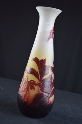 Lot 299 - Galle cameo vase - red and pink glass overlaid on opaque glass body, cut with fuschias