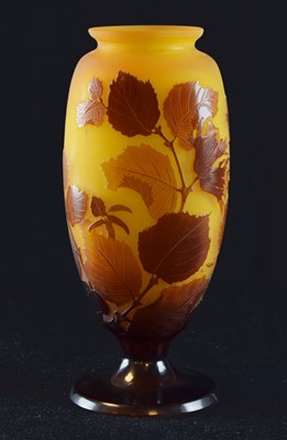 Lot 303 - Galle cameo vase - amber glass overlaid on frosted ginger body, cut with leaves