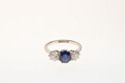 Lot 11 - Three stone sapphire and diamond ring