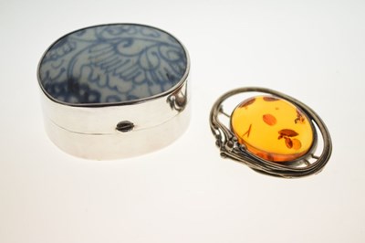 Lot 43 - Amber brooch, trinket box, and two loose sapphires