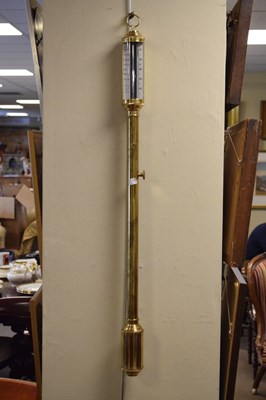 Lot 536 - Reproduction brass gimbal-mounted ships barometer