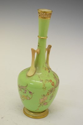 Lot 492 - Royal Worcester floral decorated green ground porcelain vase