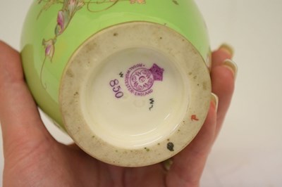 Lot 492 - Royal Worcester floral decorated green ground porcelain vase