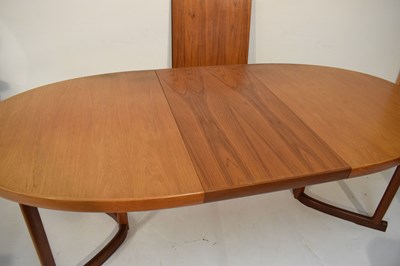 Lot 489 - Kai Kristiansen teak dining table and six model 121 open armchairs