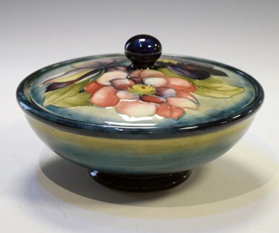 Lot 477 - Moorcroft Pottery - 'Clematis' pattern lidded powder bowl