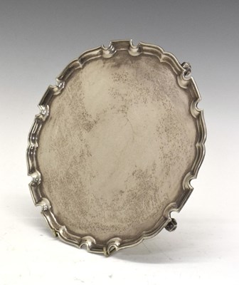 Lot 207 - Elizabeth II silver circular salver in the Georgian manner with pie crust border