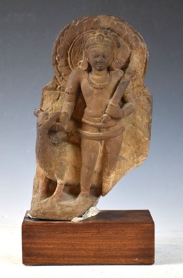 Lot 267 - Indian carved buff stone figure of Skanda / Kartikeya