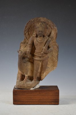 Lot 267 - Indian carved buff stone figure of Skanda / Kartikeya