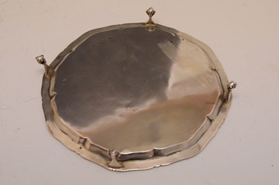 Lot 205 - George V silver salver with gadrooned piecrust edge and standing on four ball and claw feet
