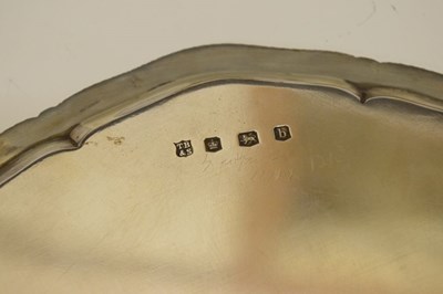 Lot 205 - George V silver salver with gadrooned piecrust edge and standing on four ball and claw feet