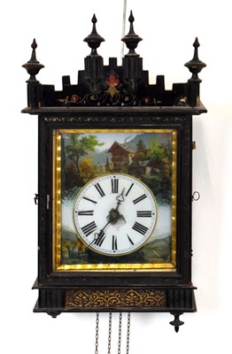 Lot 534 - Black Forest painted ebonised wall clock