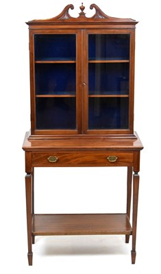 Lot 620 - Mahogany glazed display cabinet on table base