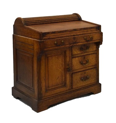 Lot 595 - Small Edwardian oak tambour-top desk