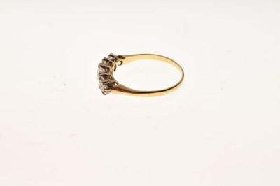 Lot 4 - '18ct' stamped yellow metal and graduated five-stone diamond ring
