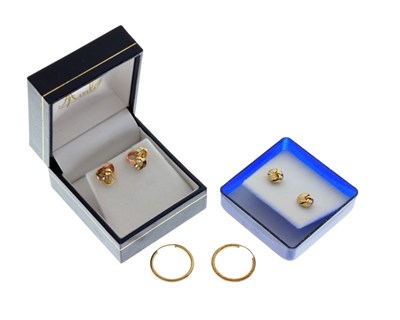 Lot 63 - Three pairs of unmarked gold earrings