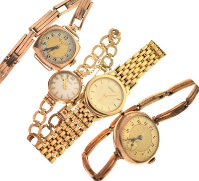 Lot 124 - Three ladies gold watches, and gold-plated Seiko watch