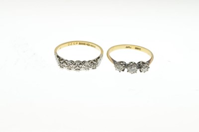 Lot 28 - Two '18ct and Plat' illusion set diamond rings