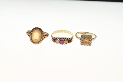 Lot 35 - Three gem set gold rings