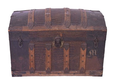 Lot 541 - Victorian faux crocodile dome-topped travelling trunk