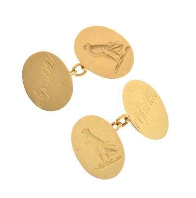 Lot 59 - Pair of 18ct gold cufflinks engraved with falcons