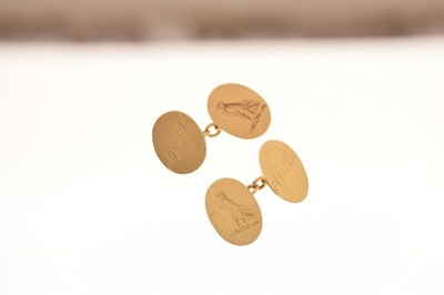 Lot 59 - Pair of 18ct gold cufflinks engraved with falcons