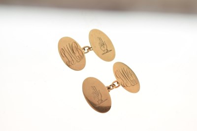 Lot 53 - Pair of 9ct gold cufflinks engraved with hand symbol