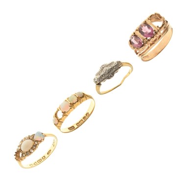 Lot 38 - Four gold dress rings, all missing stones