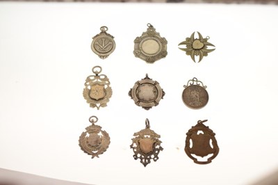 Lot 168 - Six silver and white metal fobs