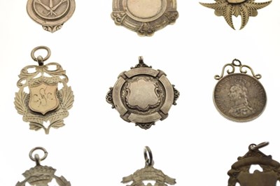 Lot 168 - Six silver and white metal fobs