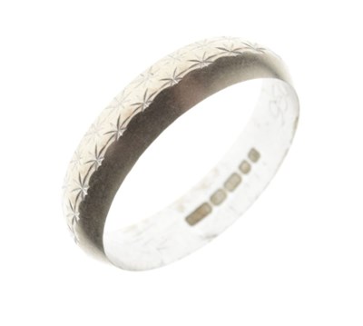 Lot 26 - 18ct white gold half-patterned wedding band