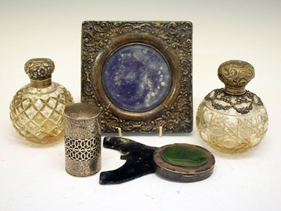 Lot 184 - Late Victorian silver mounted frame, together with two silver topped perfume bottles, etc