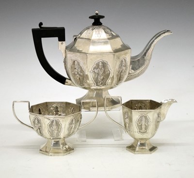 Lot 99 - Indian white metal 800 standard three-piece tea set  in the Swami manner