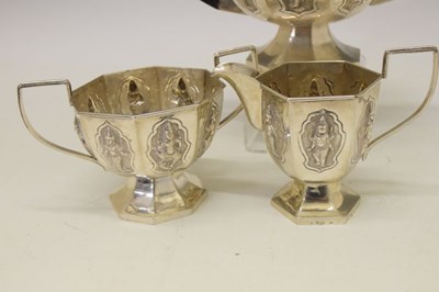 Lot 99 - Indian white metal 800 standard three-piece tea set  in the Swami manner