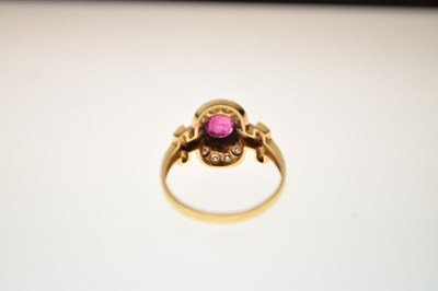 Lot 14 - Ruby and diamond cluster 18ct gold dress ring