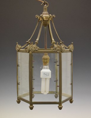 Lot 622 - Gilt metal and glazed hexagonal single light hall lantern