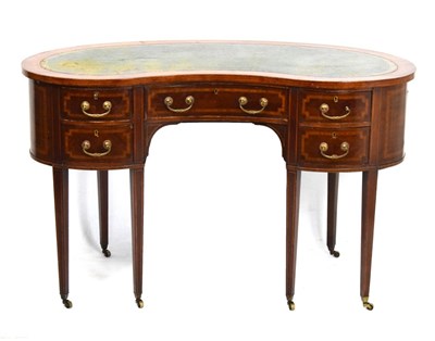 Lot 511 - Edwardian inlaid mahogany kidney-shaped desk