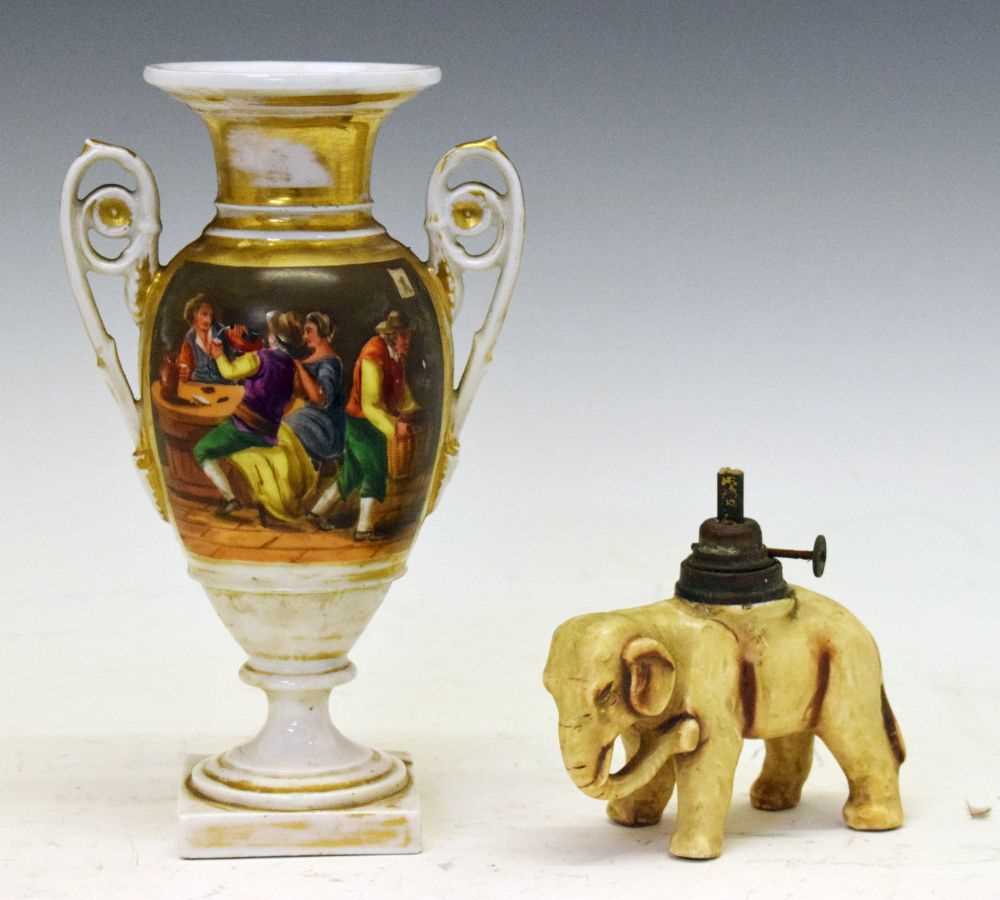 Lot 575 - Elephant oil lamp base and pedestal vase