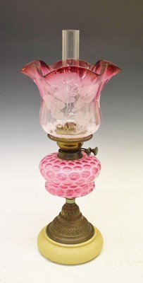 Lot 359 - Cranberry lamp with shade