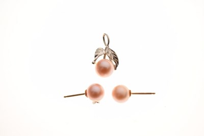 Lot 37 - White metal and cultured pearl pendant stamped '14k', together with a similar pair of stud earrings, stamped 585 (2)