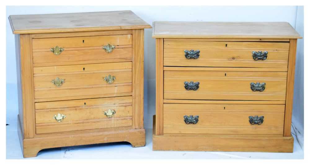 Lot 450 - Satin walnut mirror-door wardrobe, and two three-drawer chests