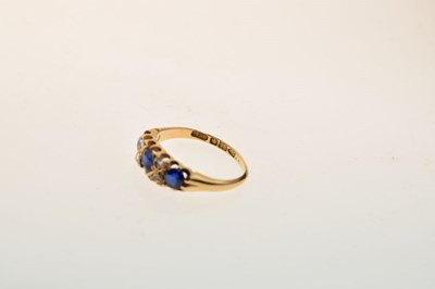 Lot 13 - Blue garnet topped doublet and diamond 18ct gold ring