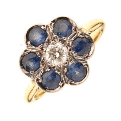 Lot 11 - Sapphire and diamond 18ct gold cluster ring
