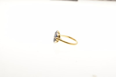 Lot 11 - Sapphire and diamond 18ct gold cluster ring