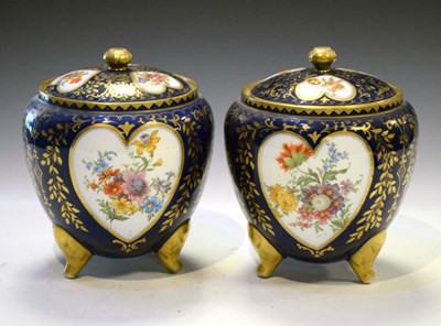 Lot 486 - Pair of ovoid jars and covers with printed heart-shaped floral panels