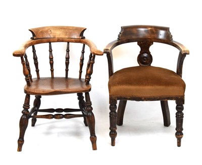 Lot 580 - Late 19th Century elm smokers bow armchair one, together with a mahogany example