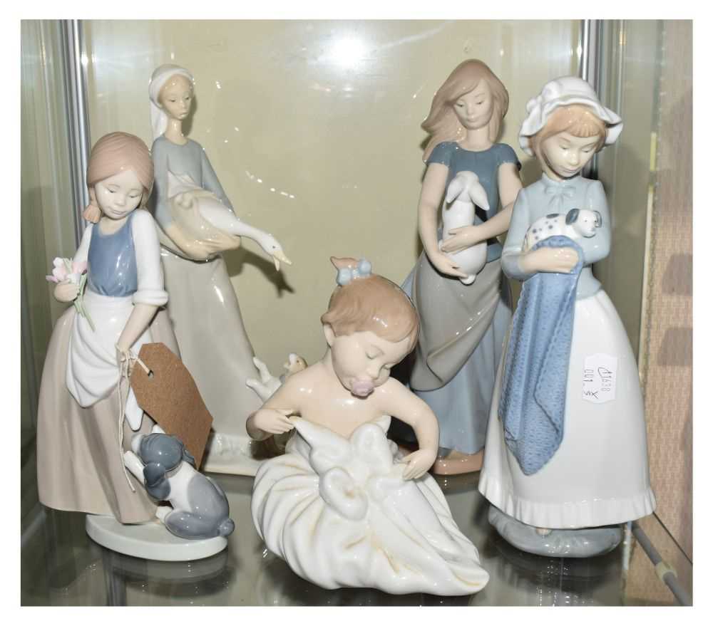 Lot 281 - Five Nao figures